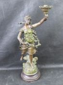 A bronzed effect light base in the form of a moan, a/f.