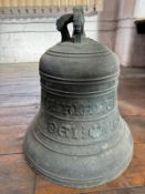 A 19th century cast metal bell having cast in crown staples from Mount St Bernards Abbey
