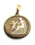 A carved shell cameo pendant, set in yellow metal, no apparent hallmark, 2.2cm wide.