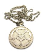 A heavy silver pendant and chain, hallmarked 375, 22.7g.