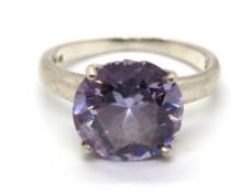 A 925 silver purple solitaire ring, size P.