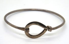 A hallmarked silver bangle.