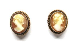 A pair of 9ct gold carved shell cameo earrings, stamped 9ct, 2.