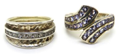 Two silver rings, size K/L.