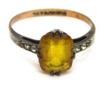A 9ct gold and silver ring with orange paste stone, size R, 2.2g.