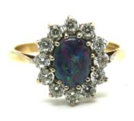 A 9ct gold opal doublet cluster ring,
