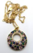A silver and multi colour stone pendant of round form stamped 925, on silver chain.