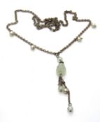 A 925 silver necklace having green stone and pearl design