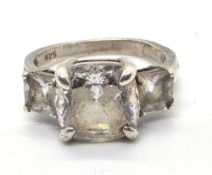 A silver and three stone cocktail ring, stamped 925, size L.