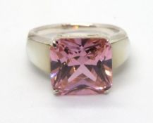 A 925 silver and pink stone cocktail ring, mother of pearl shoulders, size P-Q.