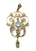 A late 19th early 20th century 9ct gold aquamarine and seed pearl pendant, stamped 9ct, approx 4.