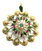 A fine 18ct gold floral pendant, a large statement piece having green enamelled leaves,