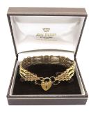 A 9ct gold gate link bracelet with heart padlock clasp, hallmarked 375, 9.
