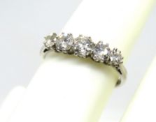 An early 20th century diamond ring set in 18ct white gold and platinum,