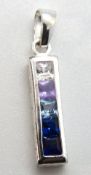 A white metal pendant set with square cut white - blue stones, 26mm inc bale.
