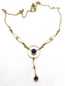 A 10k gold amethyst and diamond Edwardian necklace, suffragette purple and white colour scheme,