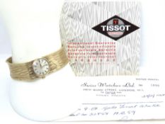 A ladies 9ct gold Tissot wristwatch,