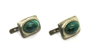 A pair of malachite stud earrings.