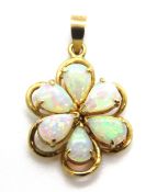 A 14ct gold and opal floral pendant, stamped 585, approx 2.6cm inc bale, 2.