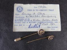 Two Rotary Club tie pins