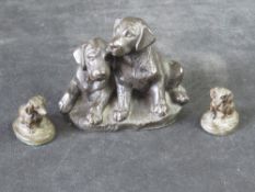 A Heredities Labrador Puppies Sculpture together with two miniature dachshund dog figurines.