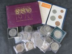 A quantity of assorted commemorative coins.