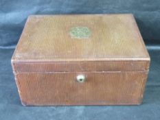 A leather covered jewellery case opening to reveal velvet lined slides within, 33 x 24 x 16cm.