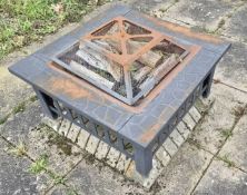 A contemporary garden fire pit.