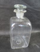 A unusual decanter having spout and stopper.