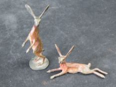 Michael Storey (British 1948-) two small bronze hares, one signed.