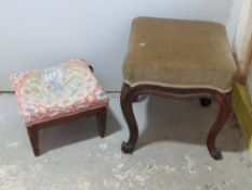 A dressing table stool and an antique footstool.