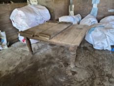 An oak extending dining table for restoration approx 220 x 120cm extended.