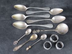 A quantity of assorted cutlery including two hallmarked silver souvenir spoons,