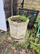 A matched pair of garden pots.