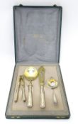 A Chilean silver cased set comprising a strainer / sifter, server, nutcrackers, and knife,