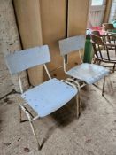 Two mid century stacking chairs.