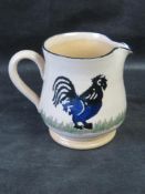 A Nicholas Mosse Irish Pottery jug in Rooster pattern.