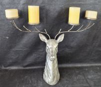 A large and impressive stags head candle holder for four full size candles, candles not included.