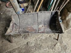 A half barrel barbecue.