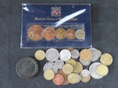 A quantity of assorted coinage including a 1797 Cartwheel coin.