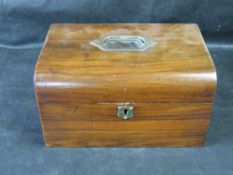 A mahogany work box opening to reveal original slides within, 25 x 18 x 15cm.