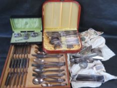 A quantity of assorted silver plated and metal cutlery.