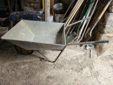 A metal wheelbarrow.