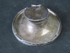 A hallmarked silver inkwell, a/f.