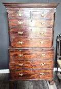 A Georgian period mahogany chest on chest, top section having two short and three long drawers.