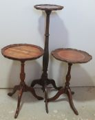 Two wine tables and a planter stand.