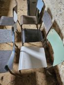 Six mid century stacking chairs.