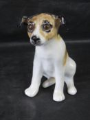 A Winstanley pottery figure of a Jack Russell Terrier, signed to base.