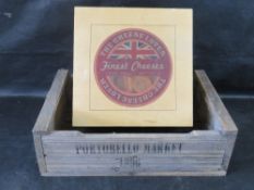 A contemporary wooden crate marked for Portobello Market, together with a wooden cheese 'crate'.