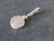 A hallmarked silver napkin holder.